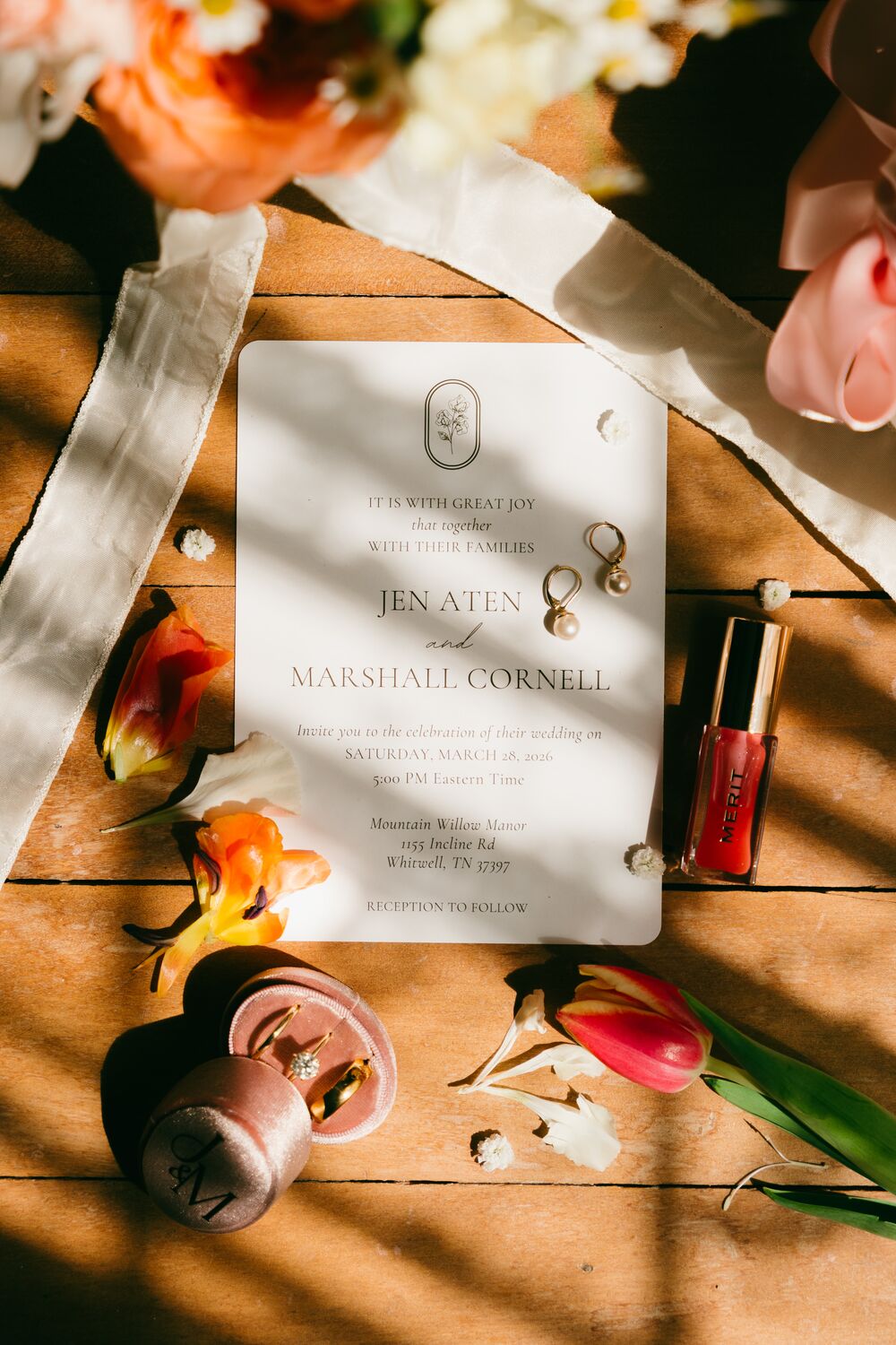 The invitation suite styled with the day's details