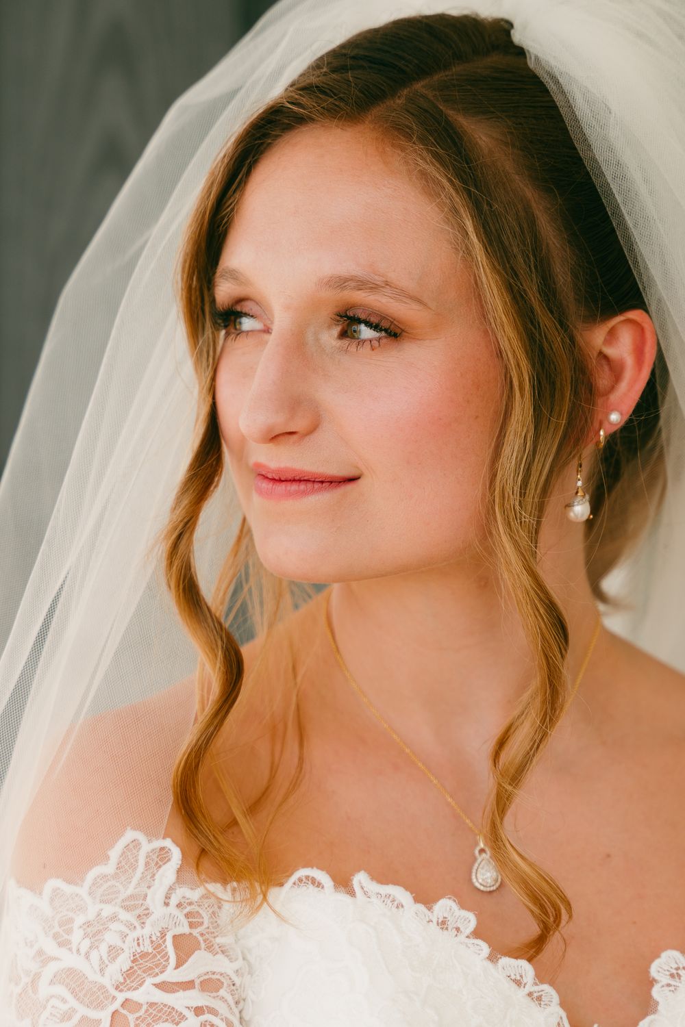 A close portrait of Eva in her veil