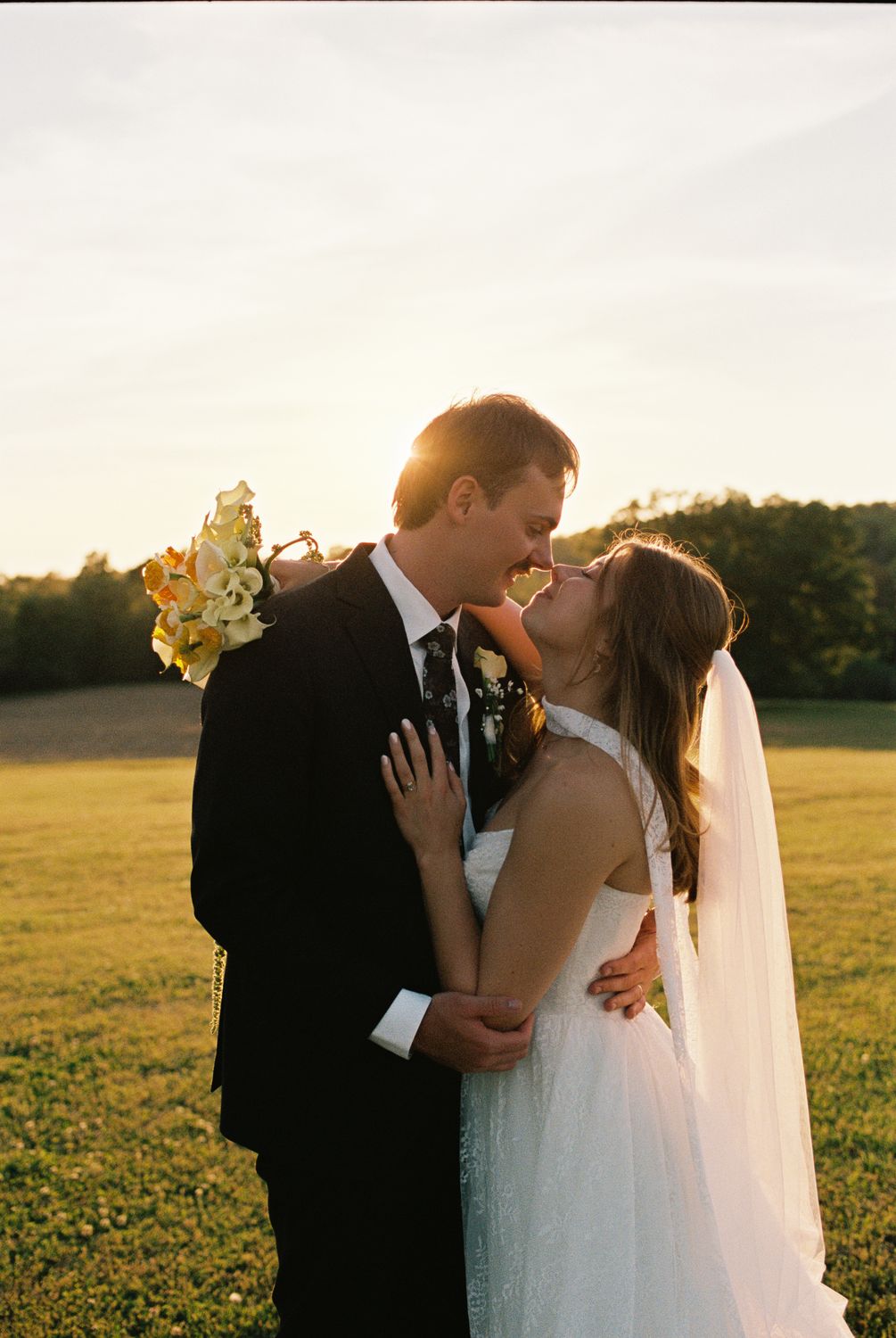A kiss at golden hour, photographed on Portra 400 film